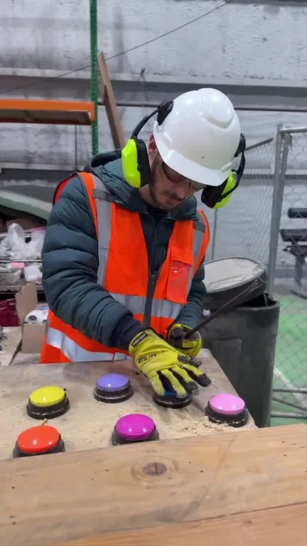 Construction Worker Plays Button Piano