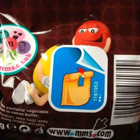 Red M&M Holding a Blue Packet