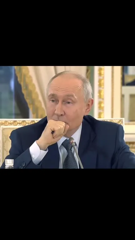 Putin Removes the Cat’s Drool