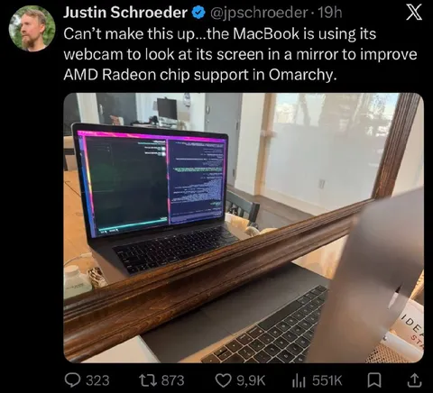 MacBook Looking at Itself in a Mirror