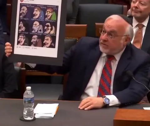Congressman Holds Conspiracy Chart