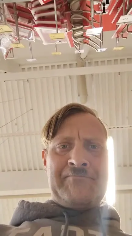 Man Shows a Strange Store Item