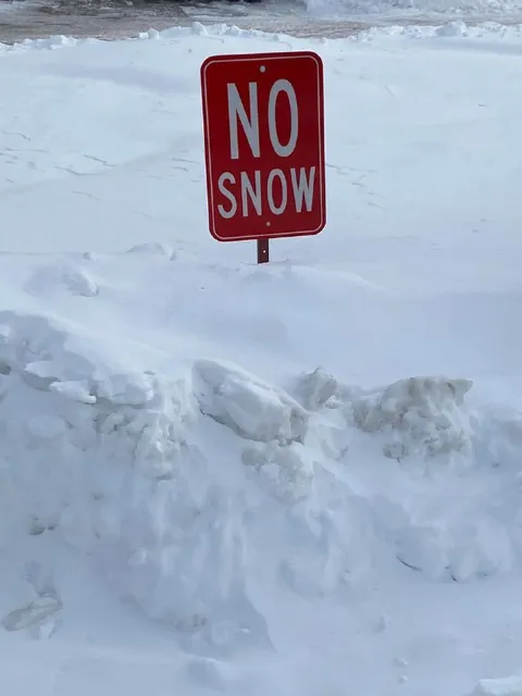 No Snow Sign in Deep Snow