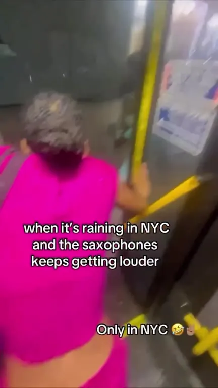 Woman Slips in NYC Rain