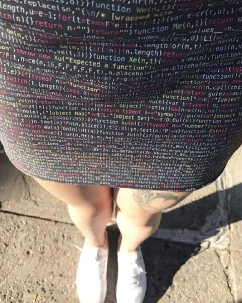 Woman Wearing a Code Skirt