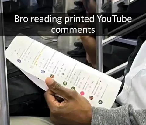 Bro Reading Printed YouTube Comments