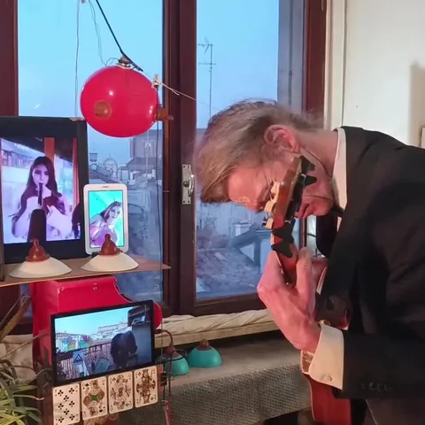 Man Plays Bass and Shofar