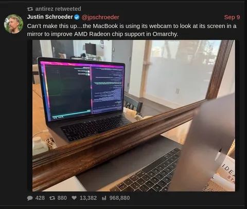 MacBook Looks at Itself in Mirror