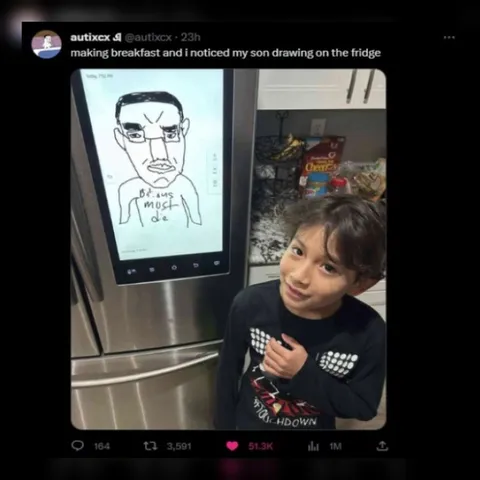 Son Drawing on the Fridge