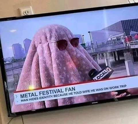 Metal Festival Fan Hides Identity