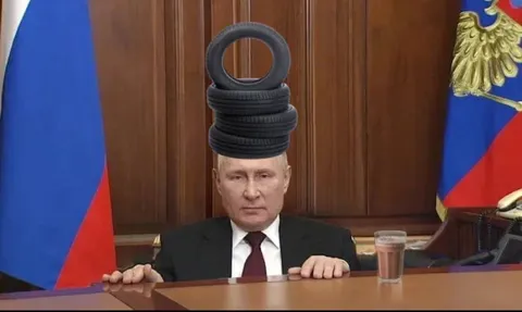Путин в шапке из шин