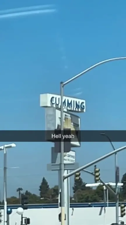 CUMMING sign says Hell yeah
