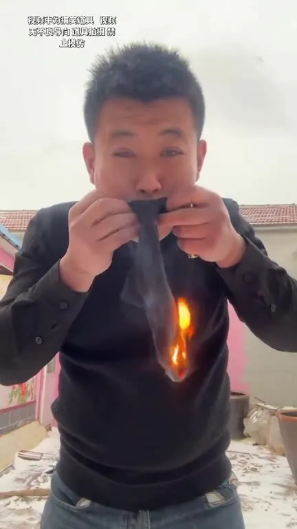 嘴里喷烟的燃烧橡胶