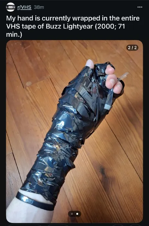 Hand Wrapped in Buzz Lightyear VHS Tape