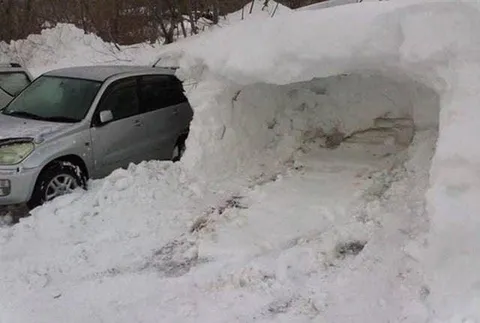 Парковочное место в снегу
