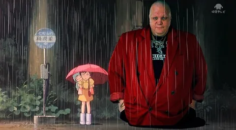 雨宿りする謎の大男