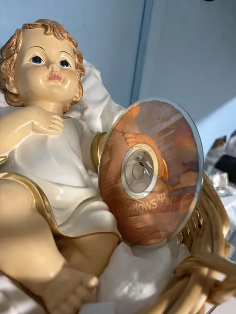 Baby Jesus Holds Windows XP
