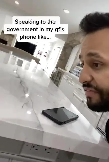 Speaking to the Government in Her Phone