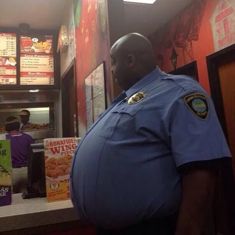 Huge Security Guard at the Counter