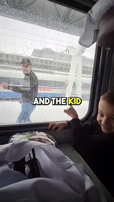 Kid Watches Dad Chase Train