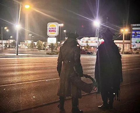 Cloaked Figures at Burger King