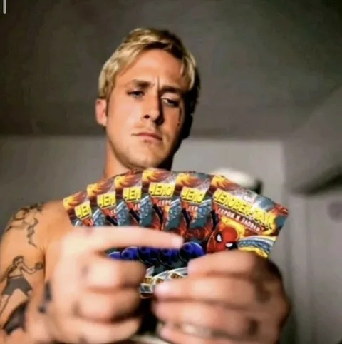 Man Holding Venom Candy Packs