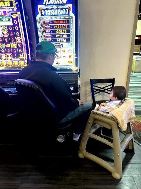 Dad Takes Baby Gambling