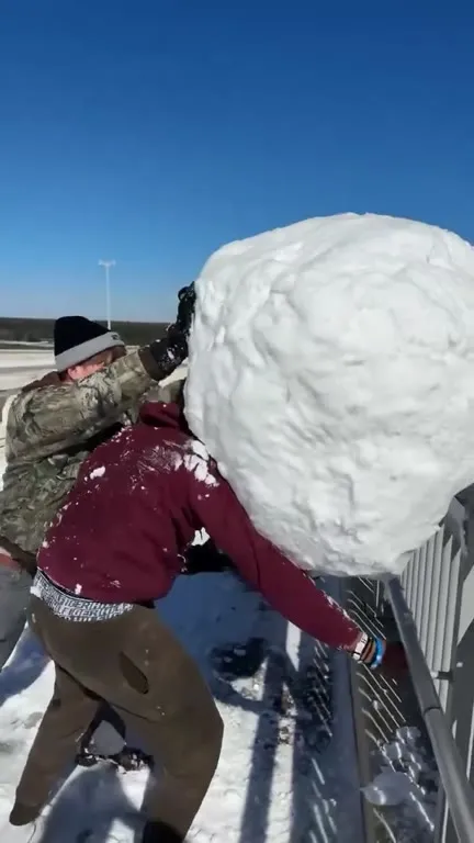 Giant Snowball Into the Water
