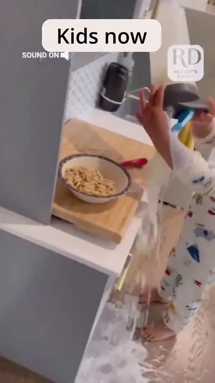 Kids Pour Milk in Cereal