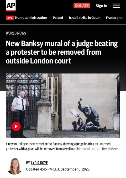 Banksy Judge Beating Protester