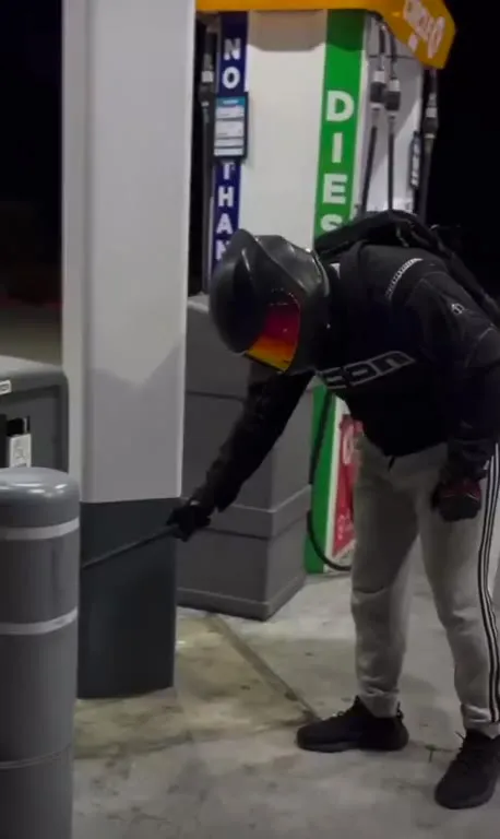 Biker Pulls the Wrong Hose