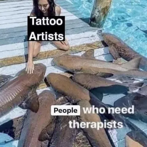 Tattoo Artists Petting Sharks