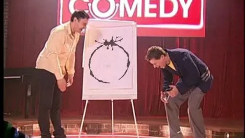 Two Men Inspecting a Strange Drawing