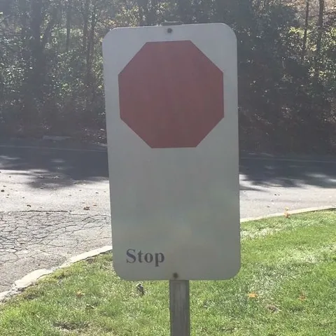 Stop sign says Stop