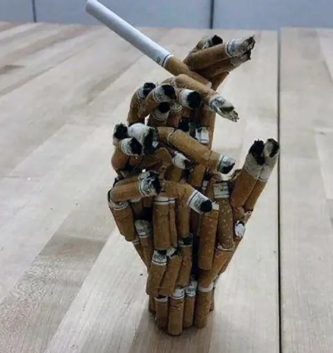 Рука из сигарет
