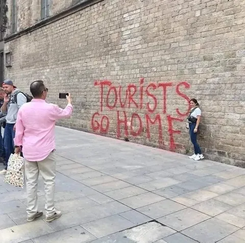 Tourists Go Home Graffiti