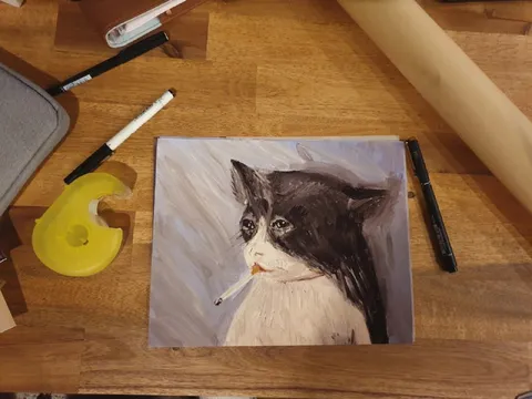 Кот с сигаретой на рисунке