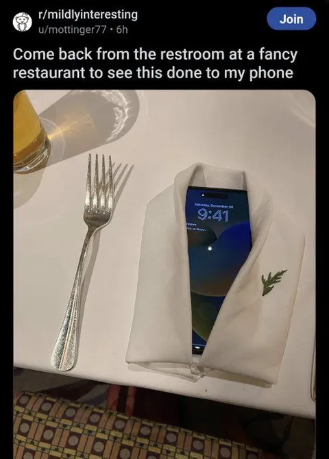 Phone Folded Into a Napkin