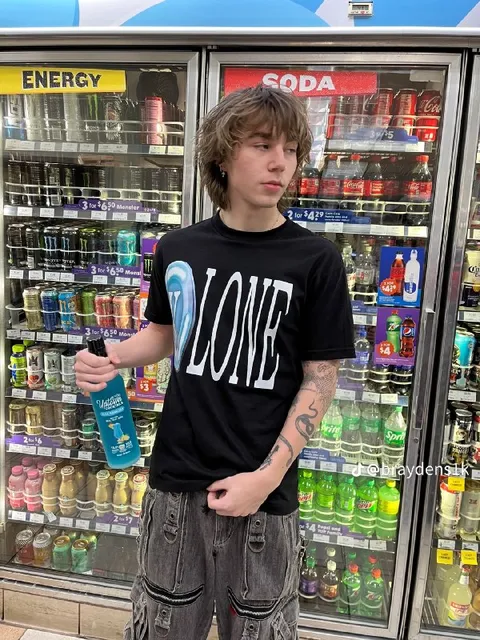 Loner Choosing Energy Drinks