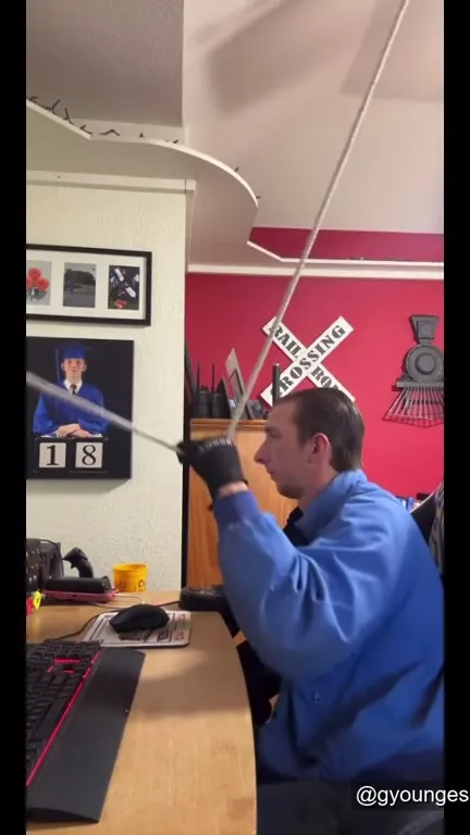 Man Pulls the Train Whistle