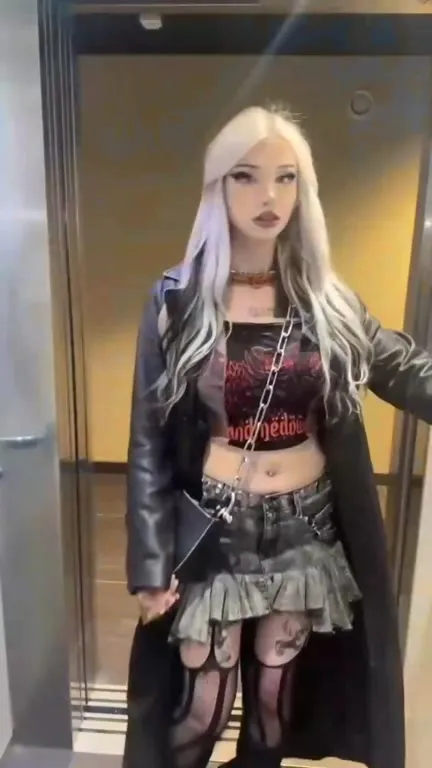 Goth Girl Enters the Elevator