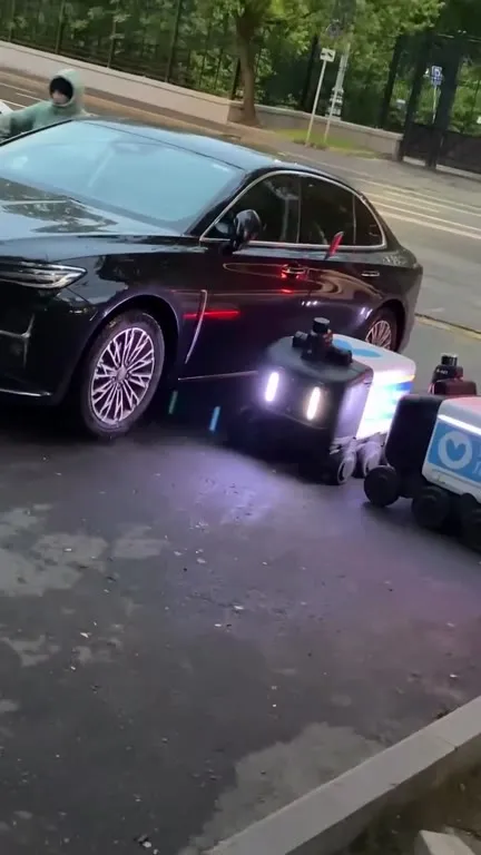 Роботы окружили роскошный автомобиль