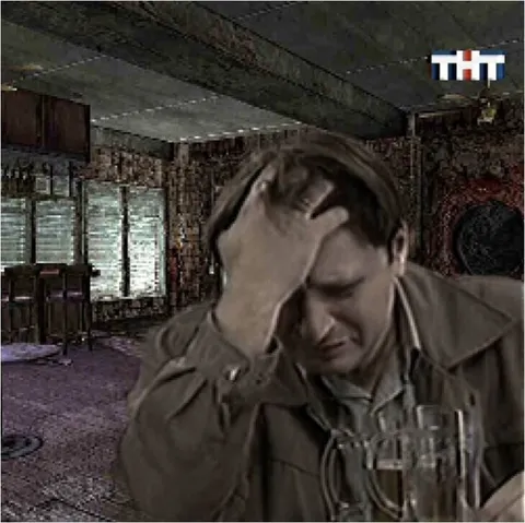 Мужчина в отчаянии за столом