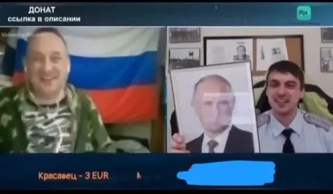 Полицейский рисует на портрете