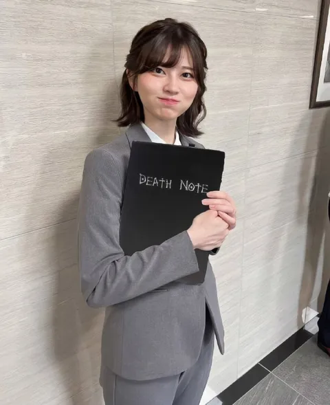 Woman Holding Death Note