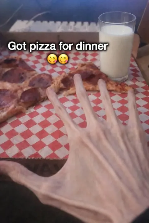 Pizza Dinner with Skeleton Hand