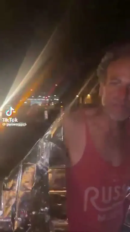 Man Wrapped in Foil at Night