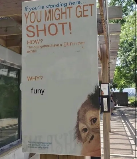 Orangutan Gun Warning Sign