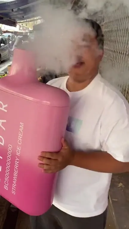 Man Smokes Giant Ice Cream