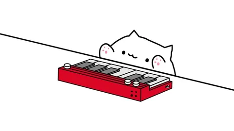 Кот играет на синтезаторе